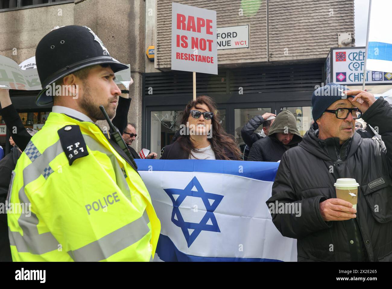 London, UK. 20th Apr, 2023. A pro-Israel supporter holds a flag during a counter protest outside Barclays bank on Tottenham Court Road in London as the Israel - Hamas war continues. (Photo by Steve Taylor/SOPA Images/Sipa USA) Credit: Sipa USA/Alamy Live News Stock Photo