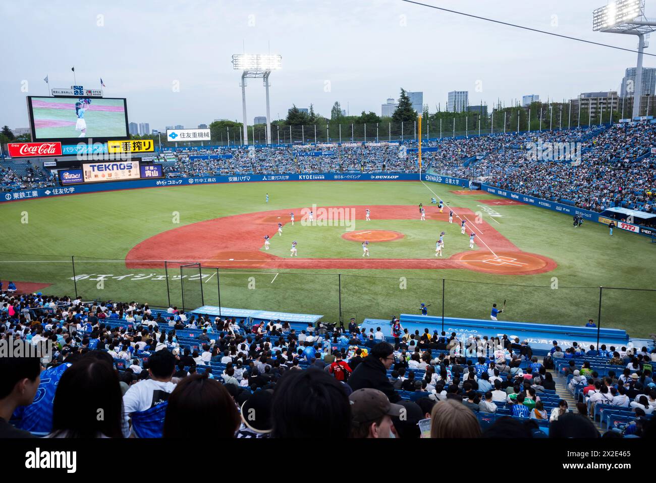 Tokyo, Japan. 20th Apr, 2024. A Yakut Swallow Game underway at the historic Meiji Jingu Gaien Stadium, the birthplace of Japanese baseball. The historic stadium is in danger of being torn down in a major redevelopment project largely opposed by fans and environmental activists to allow real estate developers with Tokyo Governor Koike's blessing to tear down the famous gingko trees to build new glass office buildings. (Credit Image: © Taidgh Barron/ZUMA Press Wire) EDITORIAL USAGE ONLY! Not for Commercial USAGE! Stock Photo