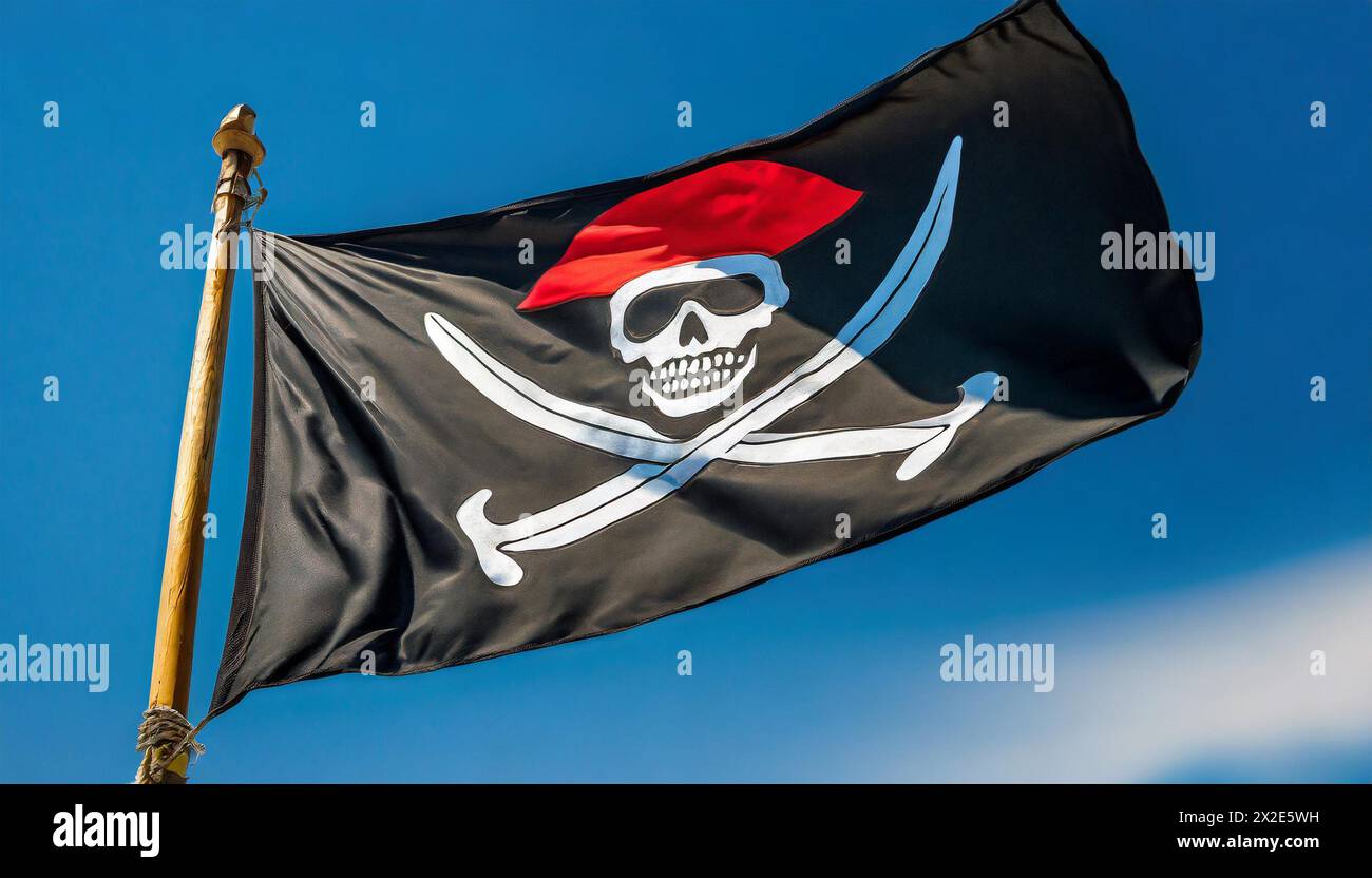 Die Piratenflagge flattert im Wind, isoliert, gegen den blauen Himmel Stock Photo