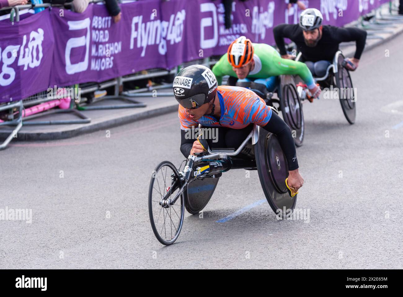 Sho Watanabe competing in the TCS London Marathon 2024 passing through Tower Hill, London, UK. Stock Photo