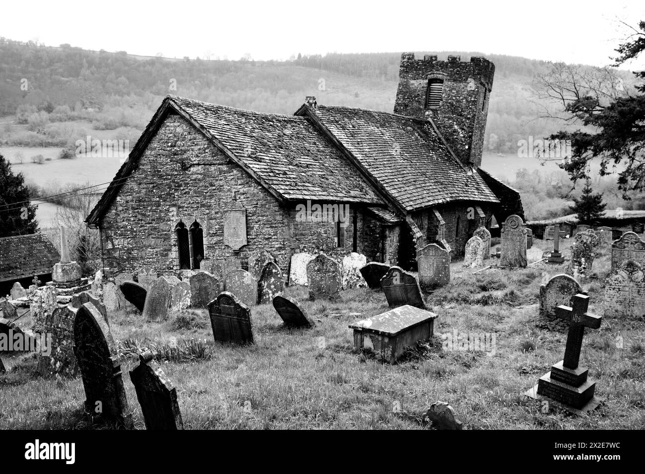 St Martin’s Church, Cwmyoy, Monmouthshire is a mainly C13th Grade I listed building most notable for its twisted, distorted shape – the result of grou Stock Photo