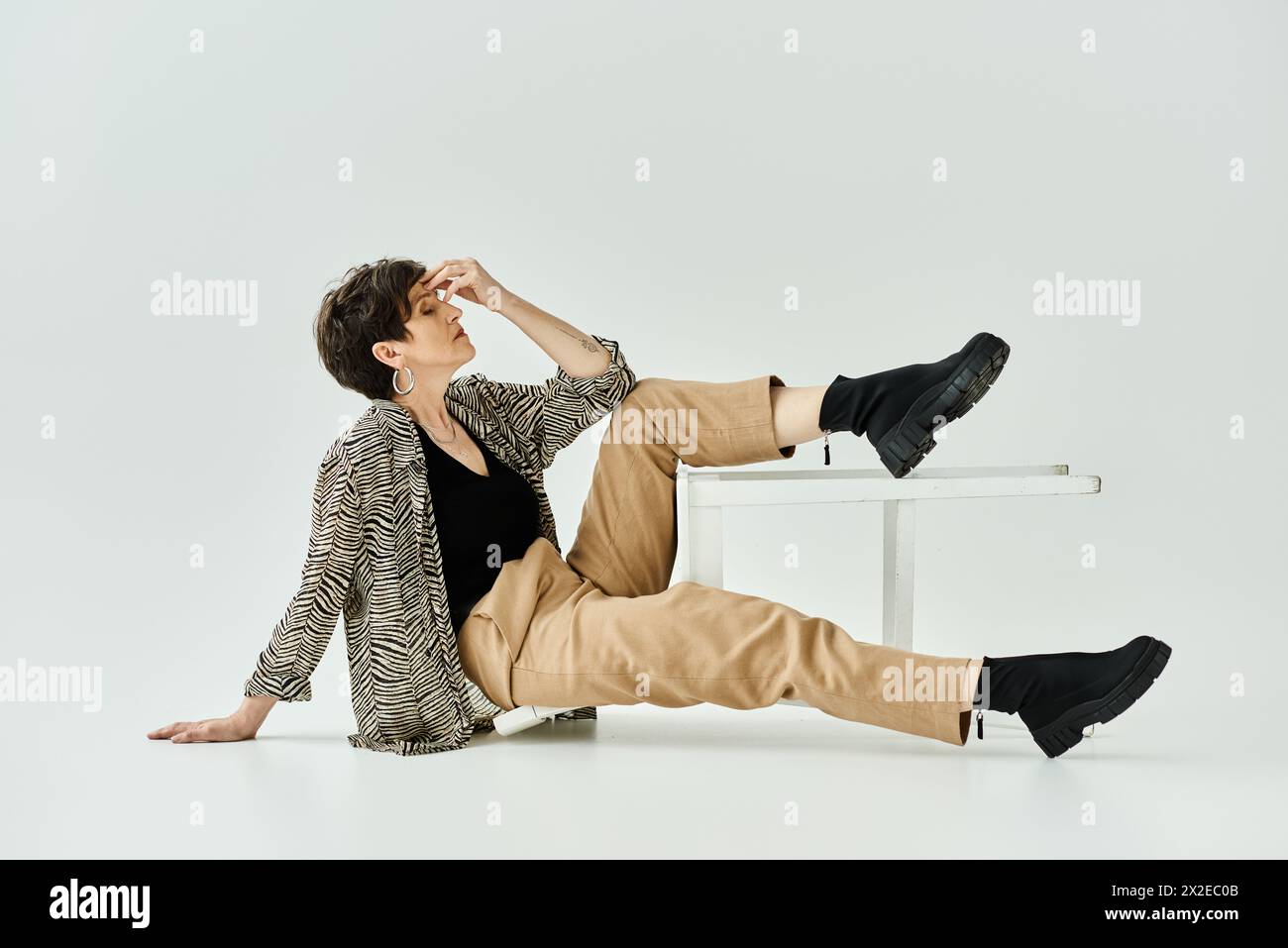 Seated individual in relaxed hi-res stock photography and images - Alamy