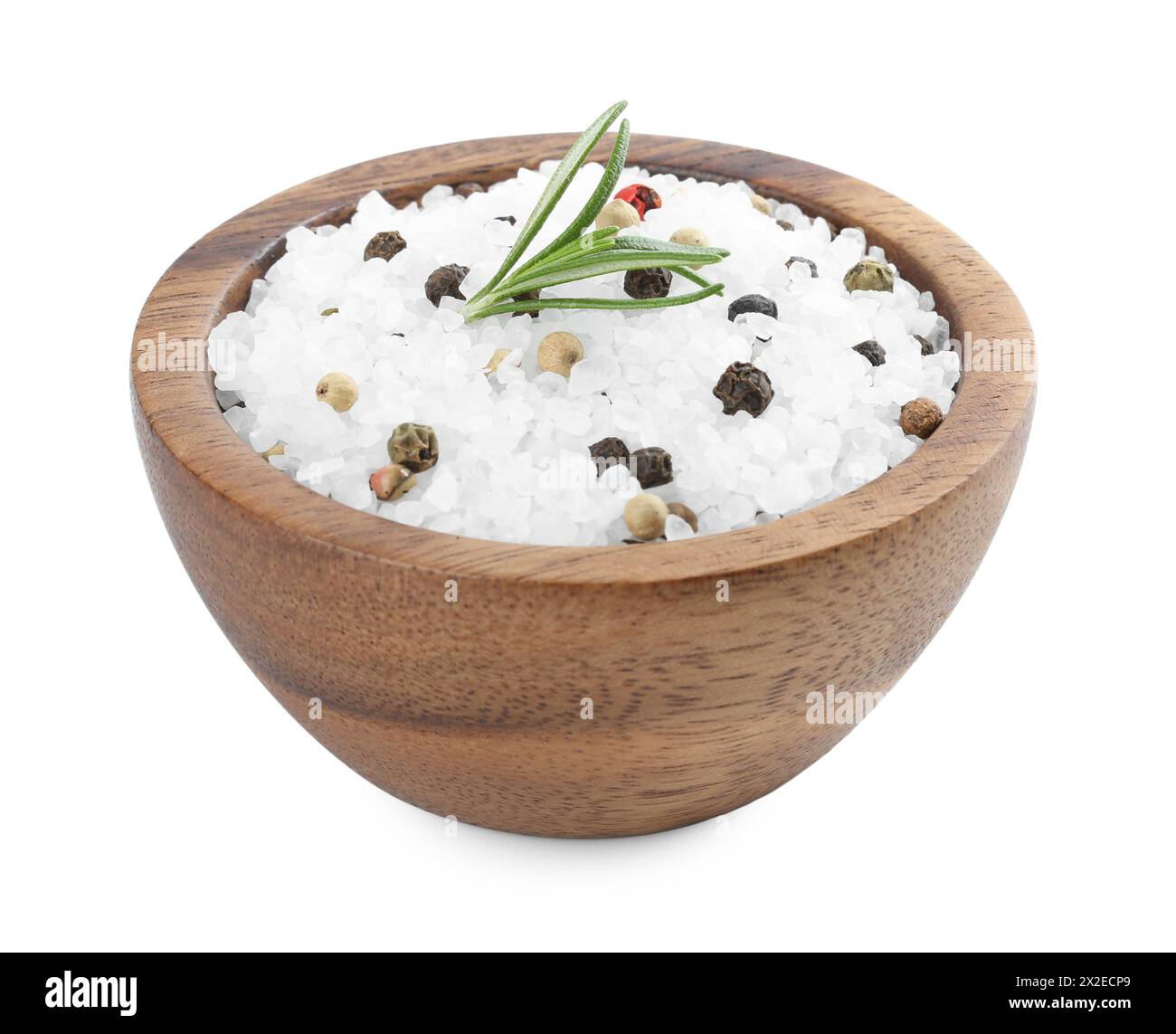 Salt with fresh rosemary and peppercorns in wooden bowl isolated on white Stock Photo
