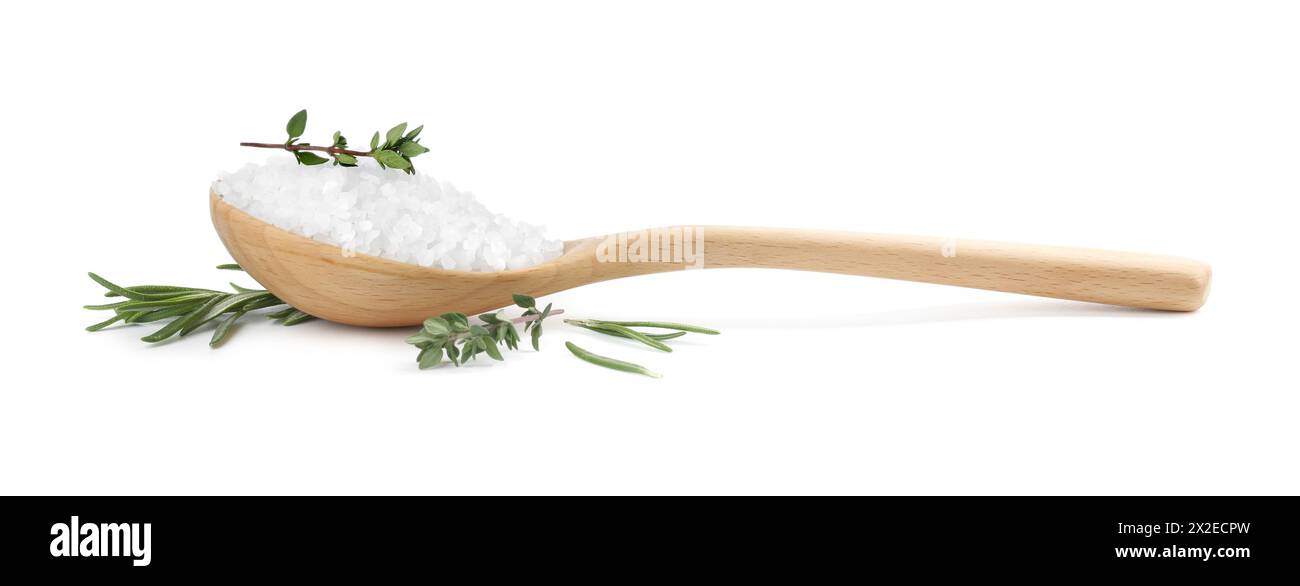 Salt with herbs in spoon isolated on white Stock Photo