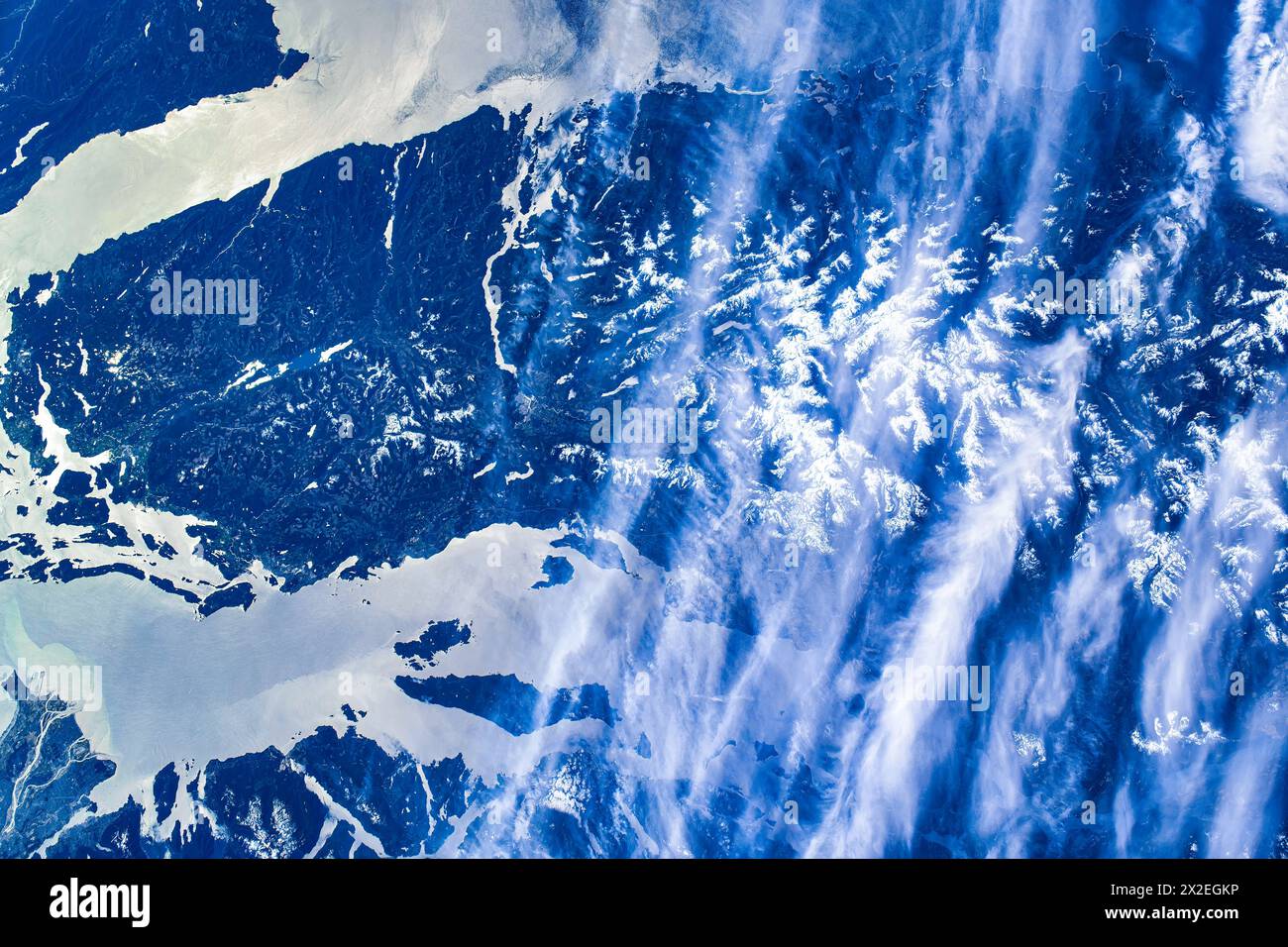 Body of water and land feature. The ISS is close to the William Lake area in British Columbia, Canada. Digital enhancement of an image by NASA Stock Photo