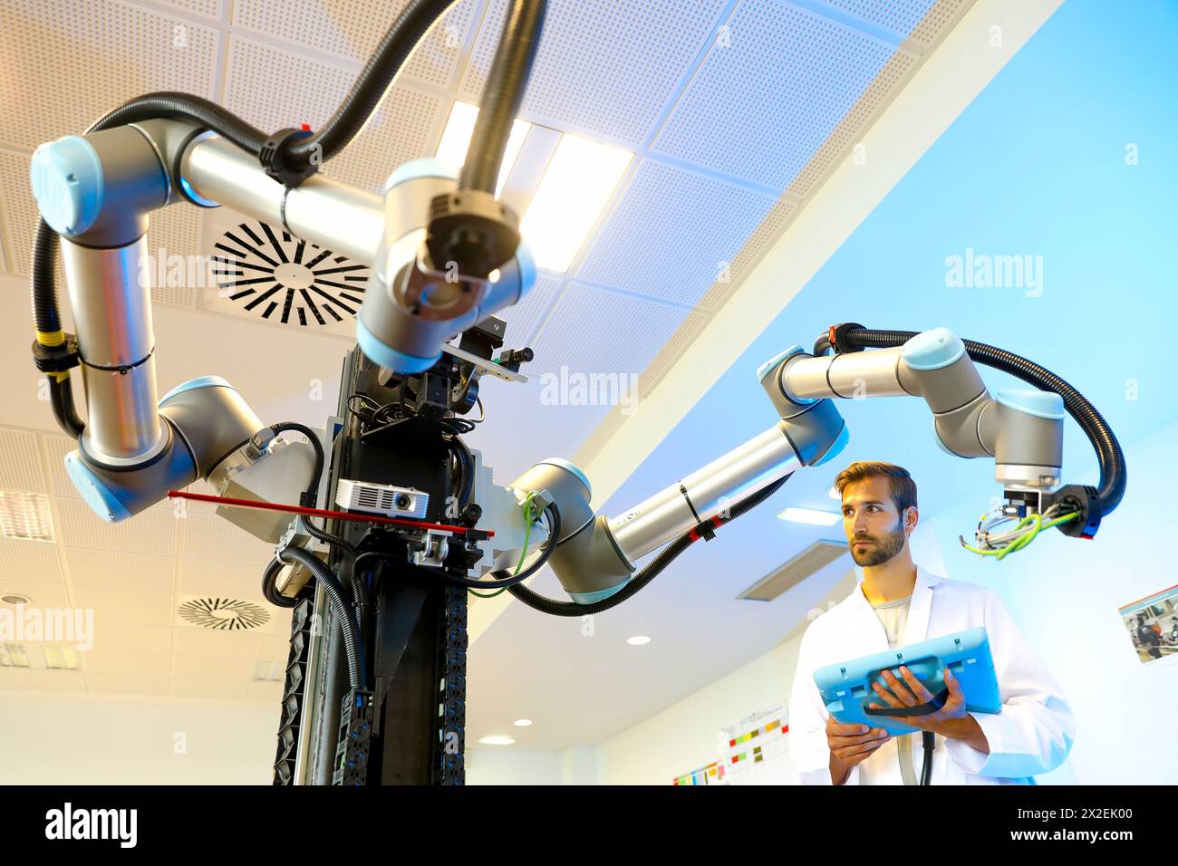 Robot with two arms for mobile manipulation, Humanoid robot for automotive assembly tasks in collaboration with people, Industry, Tecnalia Research & Stock Photo