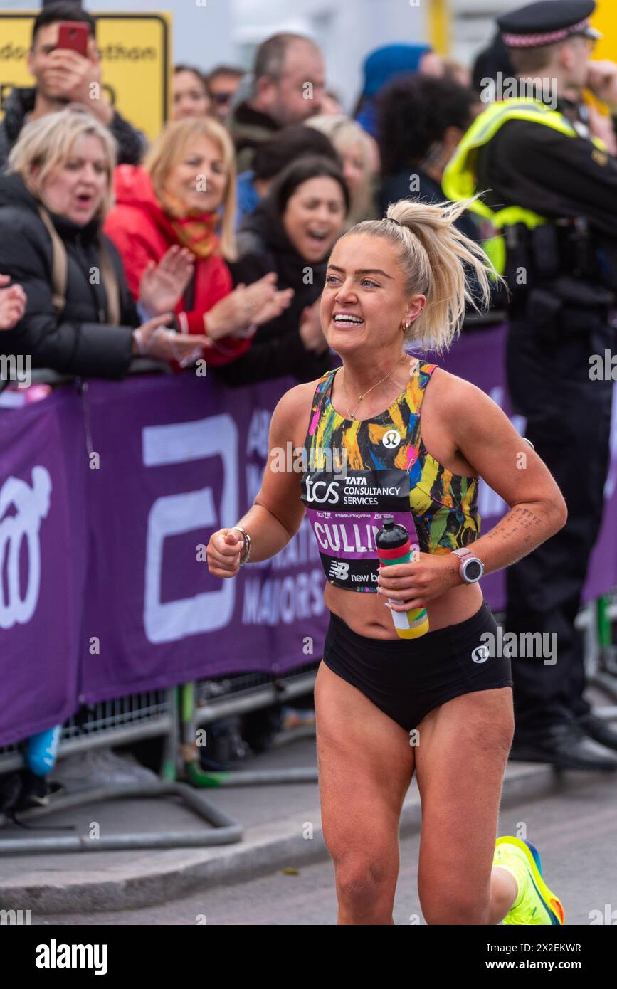 Anya Culling competing in the TCS London Marathon 2024 passing through Tower Hill, London, UK. Stock Photo