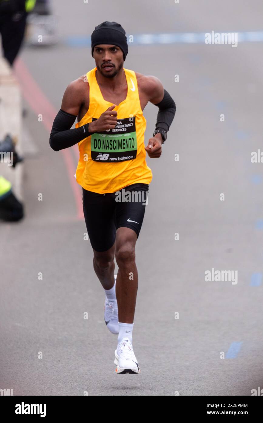 Daniel Ferreira do Nascimento competing in the TCS London Marathon 2024 passing through Tower Hill, London, UK. Stock Photo