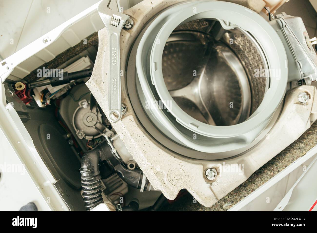 Gasket mount of a front loading washing machine being serviced without