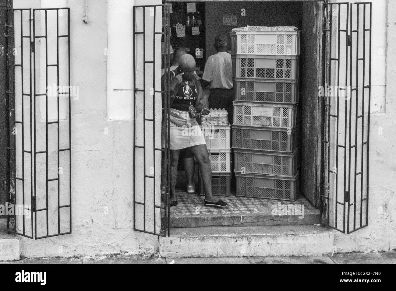 Cuban person leaving a ration book store Stock Photo