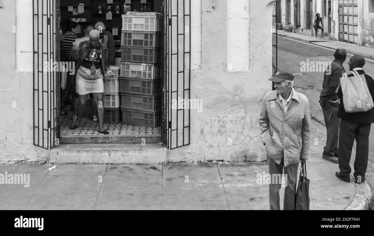 Cuban people by a ration-book store, Matanzas, Cuba Stock Photo