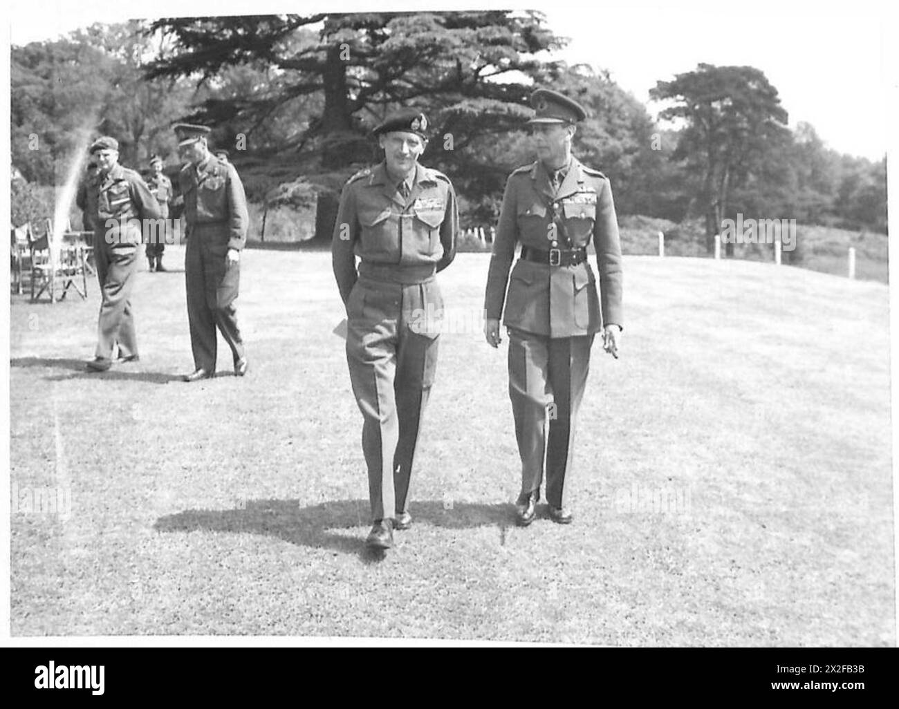 THE KING VISITS GENERAL MONTGOMERY'S H.Q. - The King and General Montgomery walking round the General's H.Q British Army Stock Photo