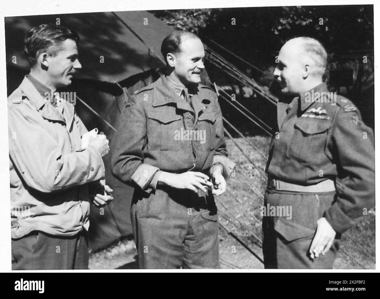 21ST ARMY GROUP OFFICERS - Lieutenant C.W. Sanford [U.S.A. Major C.D. O'Gowan [British] 7 Major A.S. McDonald [Canada] , British Army Stock Photo