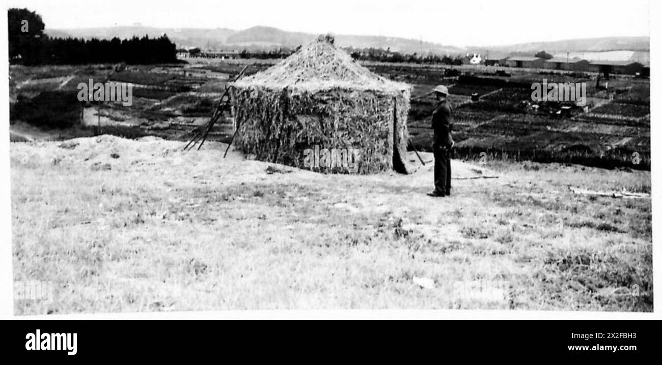 DEFENCES IN SHORNCLIFFE AREA - Pillbox camouflaged as a haystack. Folkestone - Ashford Road British Army Stock Photo