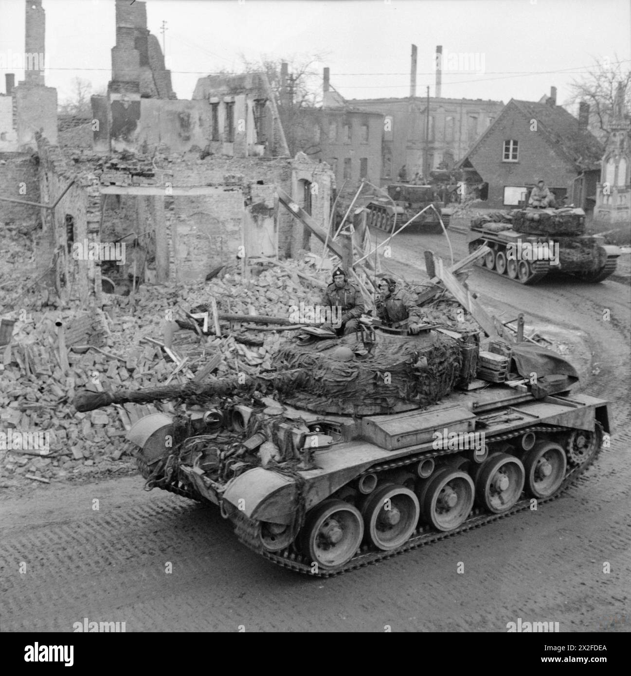 Comet tanks of the British 11th Armoured Division are positioned in a ...