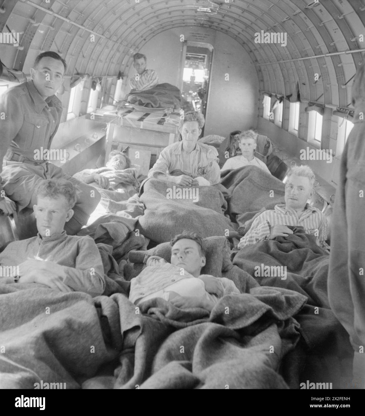 ROYAL AIR FORCE OPERATIONS IN THE MIDDLE EAST AND NORTH AFRICA, 1939-1943. - Battle casualties loaded into a Lockheed Hudson Mark VI of No. 216 Group RAF at Castel Benito, Libya, for evacuation to hospitals in Egypt Royal Air Force, Group, 216 (Air Transport and Ferry) Stock Photo