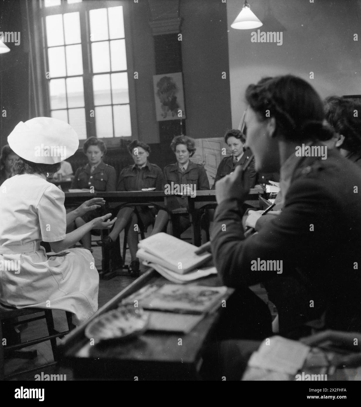 Chief instructor Mrs Evans teaches a Domestic Science class to ATS ...