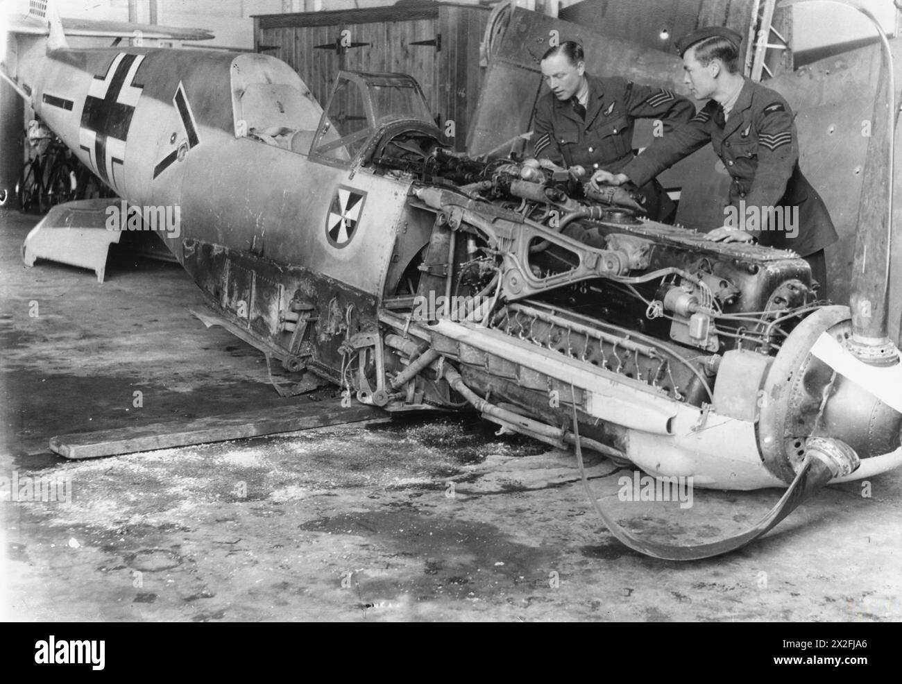 THE BATTLE OF BRITAIN - Two Royal Air Force sergeant aircrew inspect ...