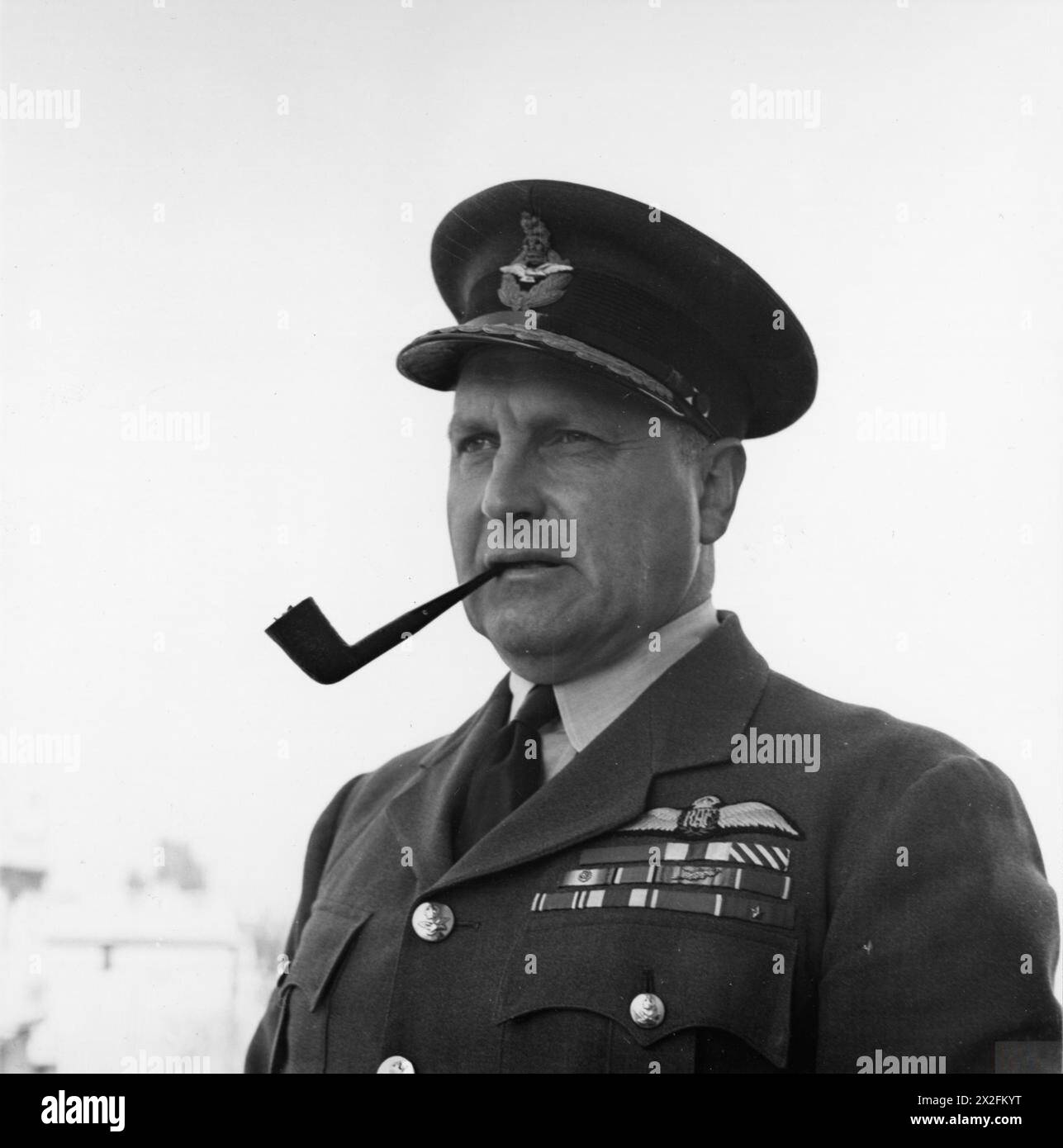 Air Chief Marshal Sir William Sholto Douglas stands outside RAF Middle ...
