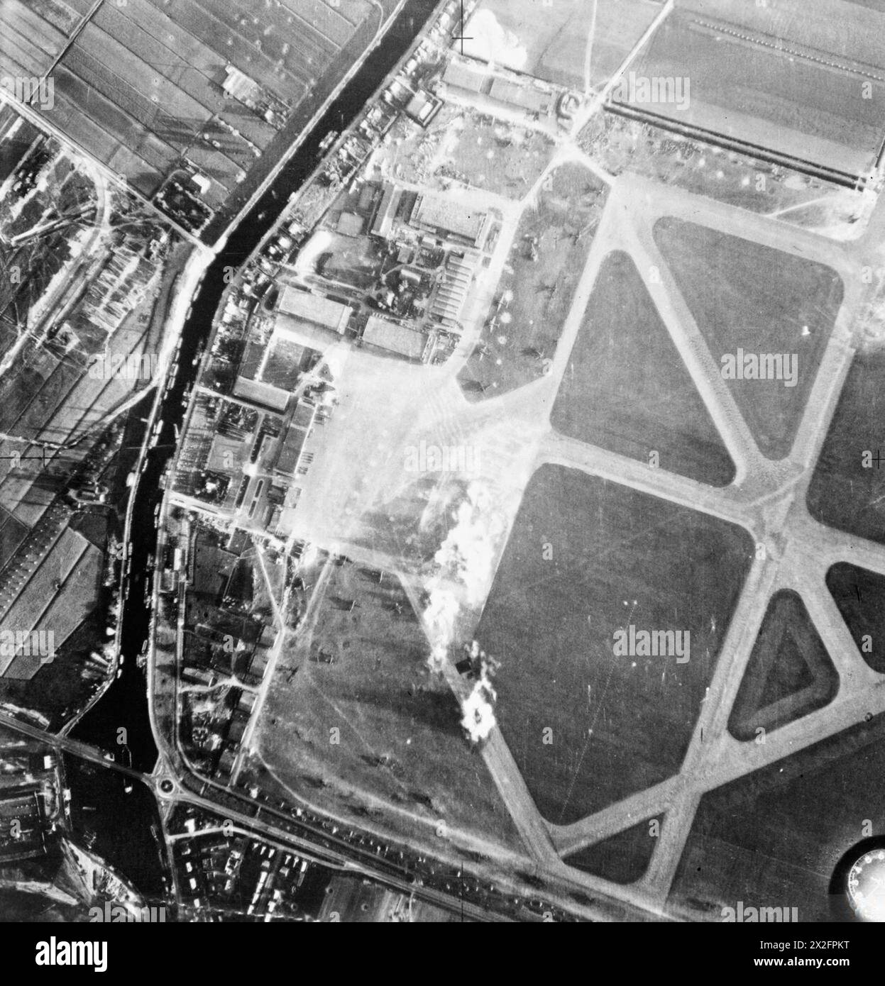 Bristol Blenheim Mark IV aircraft of No. 2 Group RAF dropping a salvo ...