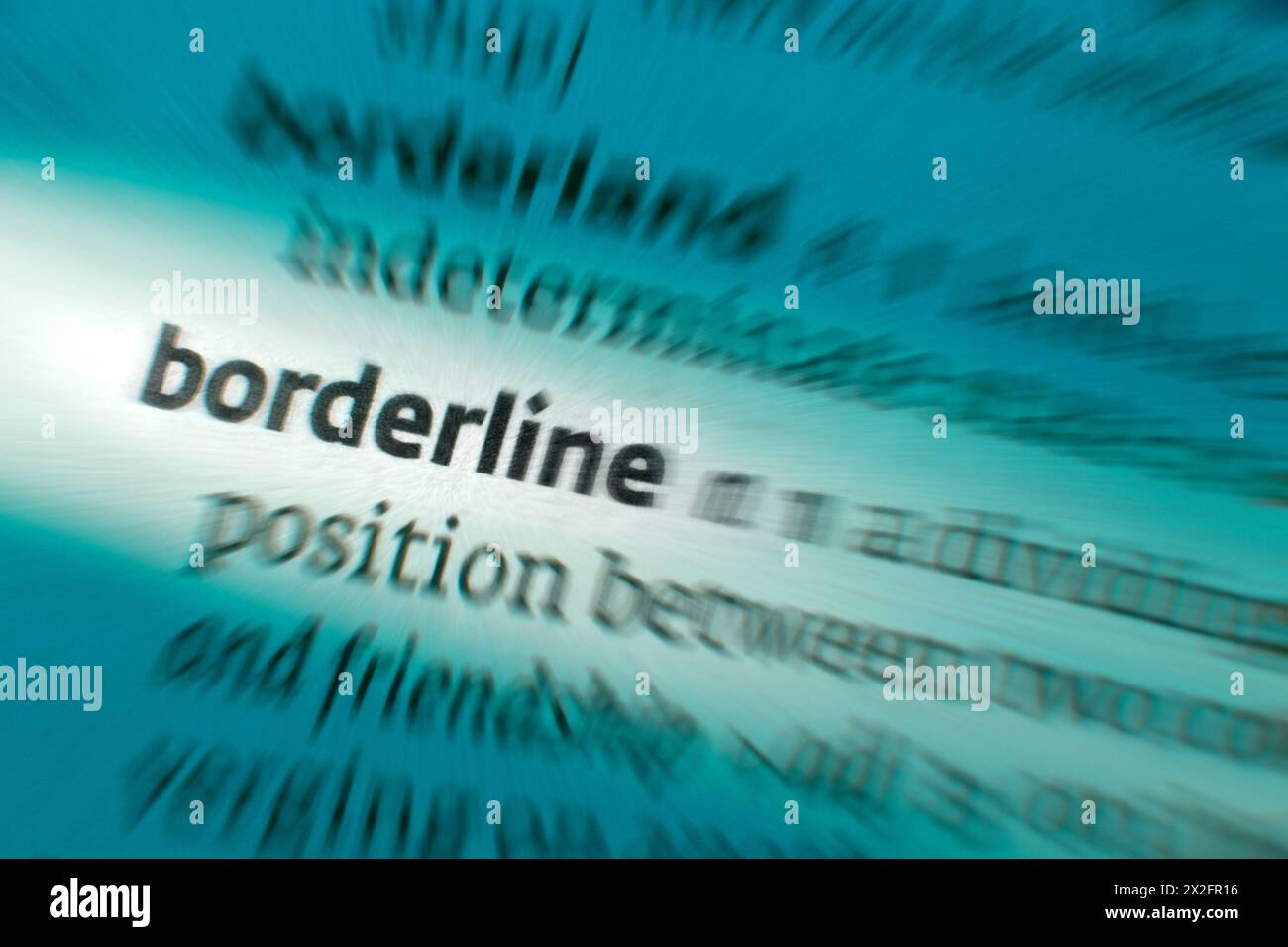 Borderline - only just acceptable in quality or as belonging to a category. A boundary separating two countries or a division between two distinct or Stock Photo