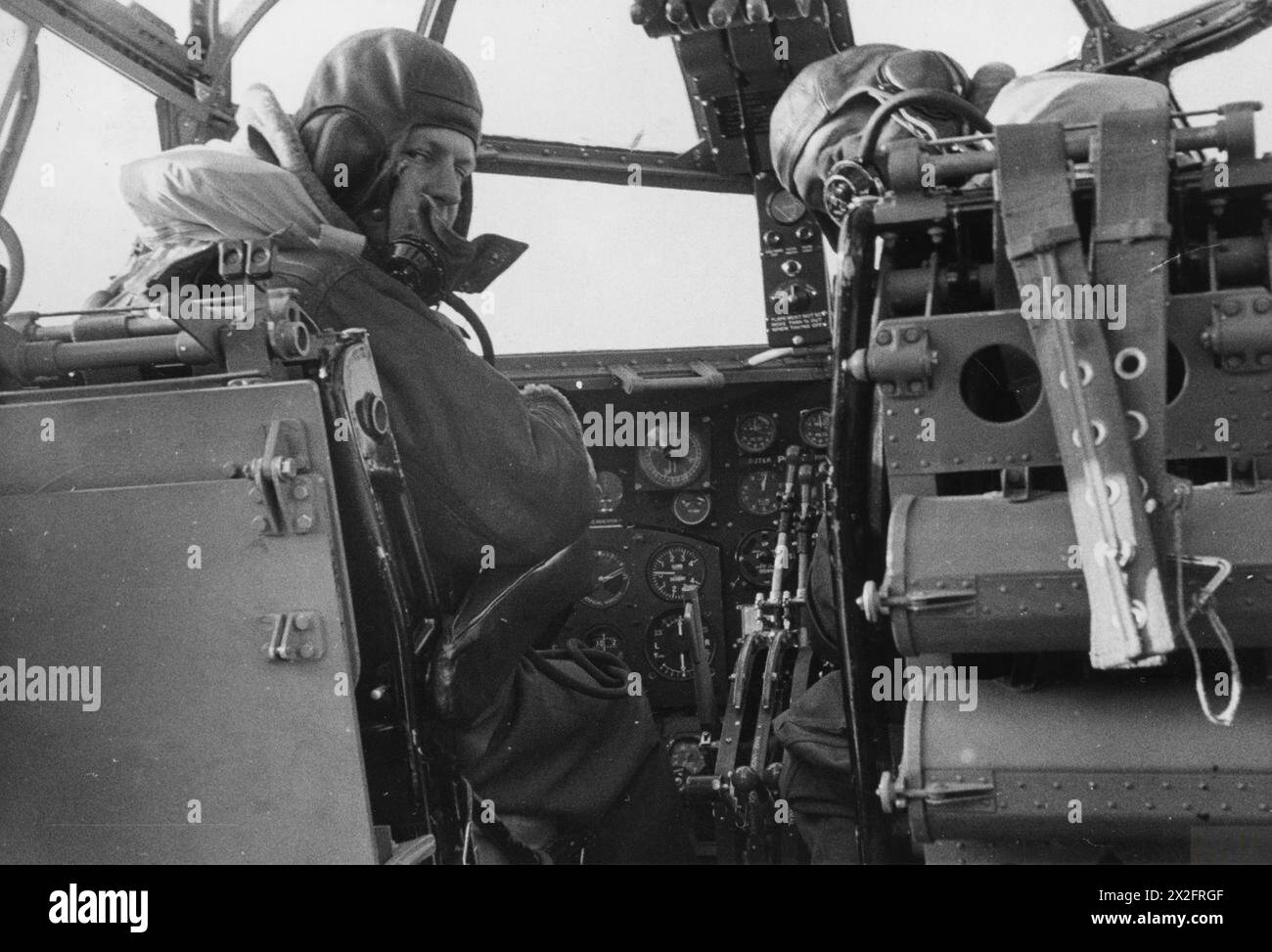 RAF BOMBER COMMAND - The pilot and second pilot of a Short Stirling in the cockpit of their aircraft, October 1941. Probably No. 7 Squadron at Oakington Stock Photo