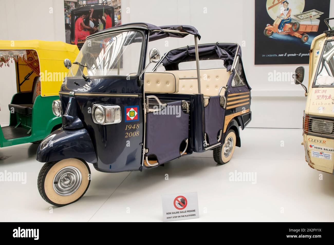 An old presidential Ape on display at the Piaggio museum in Pontedera, Pisa, Italy Stock Photo