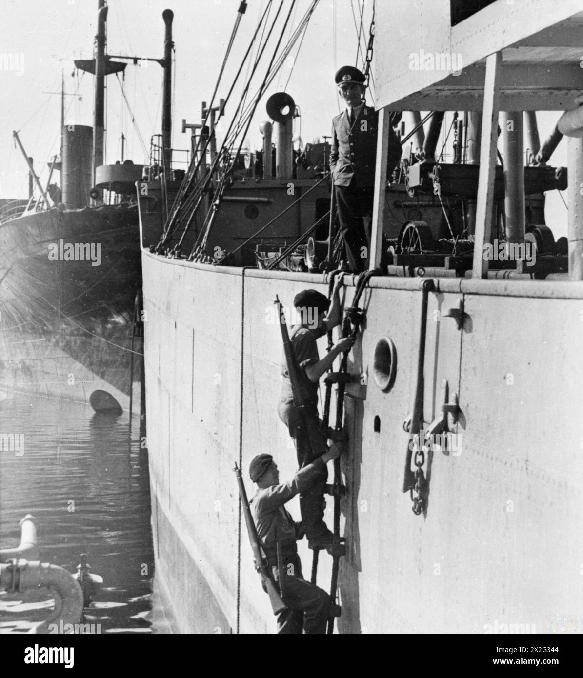 ROYAL MARINES GUARD GERMAN MERCHANT SHIPS. MAY 1945, KIEL, GERMANY ...