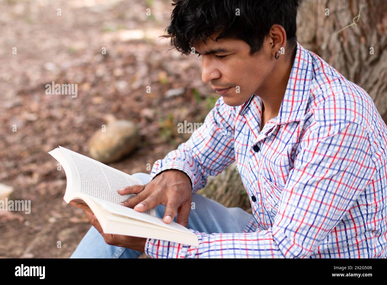 Young man in nature outdoors green hi-res stock photography and images ...