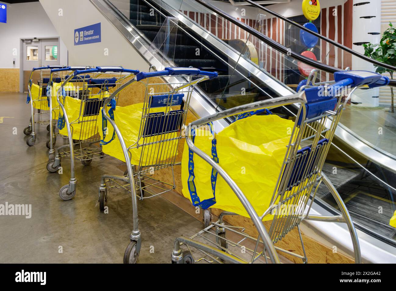 Shopping carts lined up at the entrance to the IKEA home store in Orlando, Florida Stock Photo