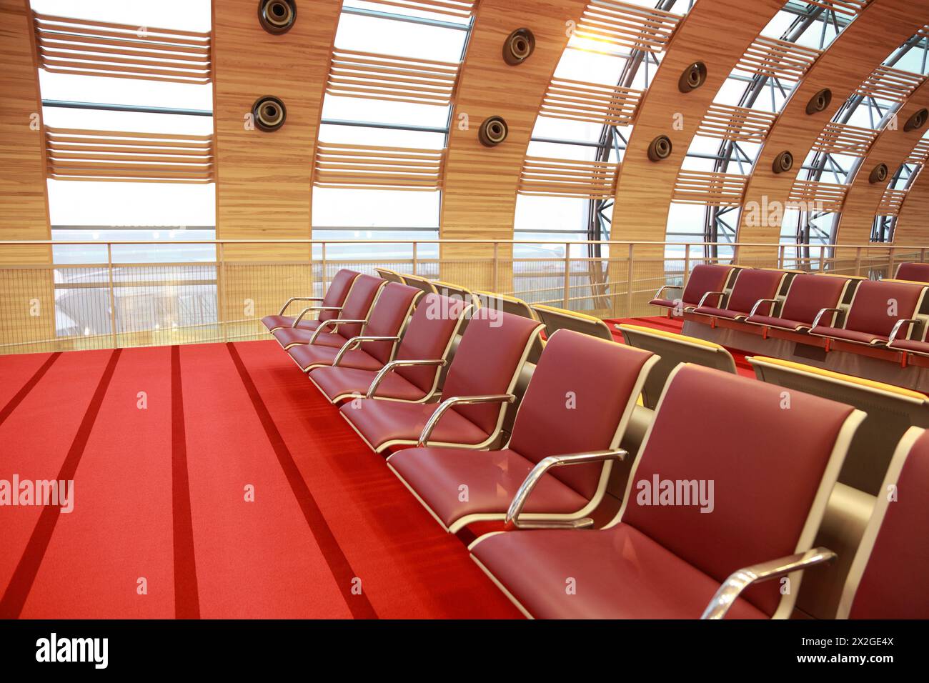 Empty Waiting Room At Airport Red Floor And Armchair Big Windows empty-waiting-room-at-airport-red-floor-and-armchair-big-windows