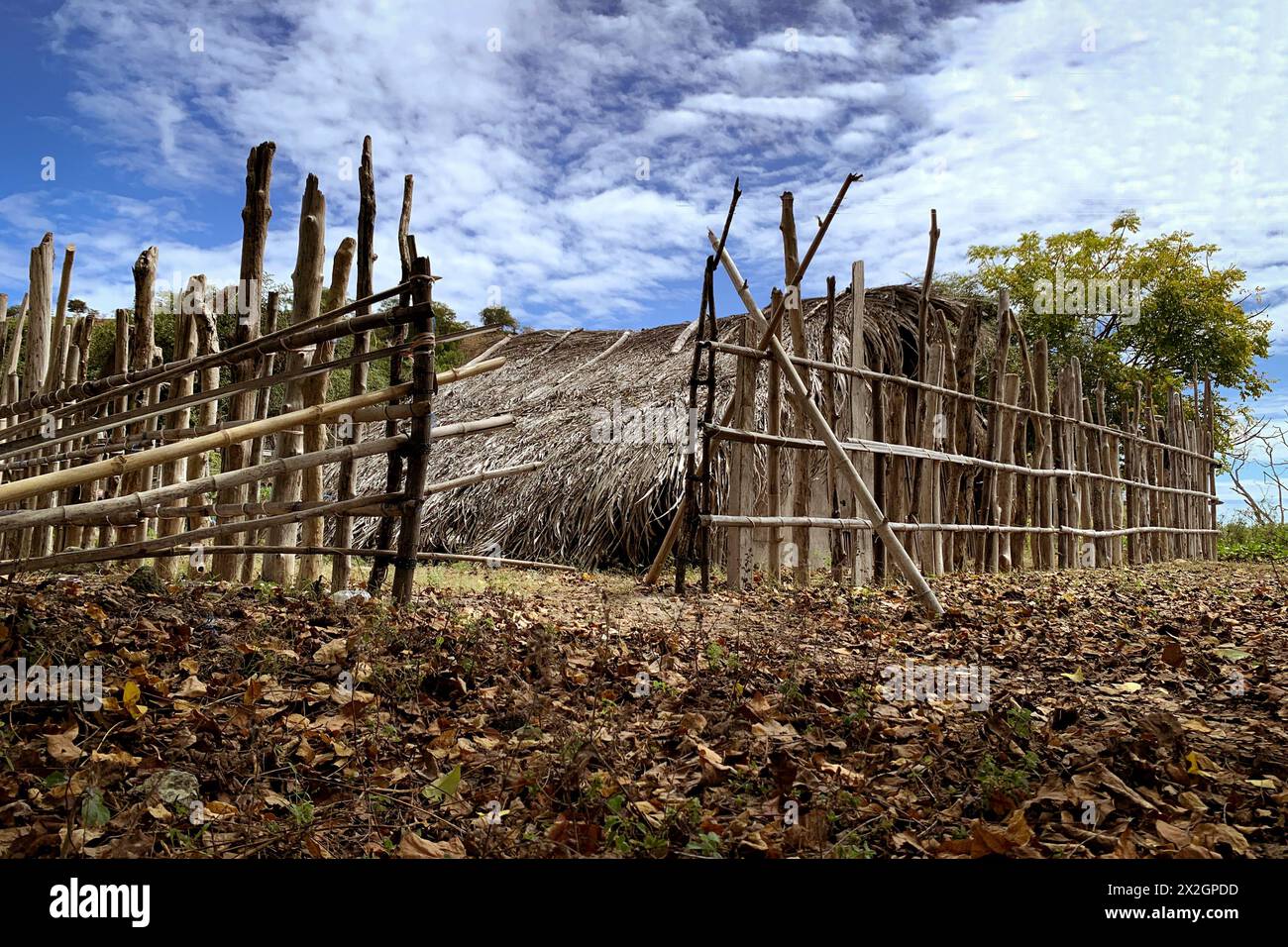 View of traditional house with wooden fence Stock Photo - Alamy