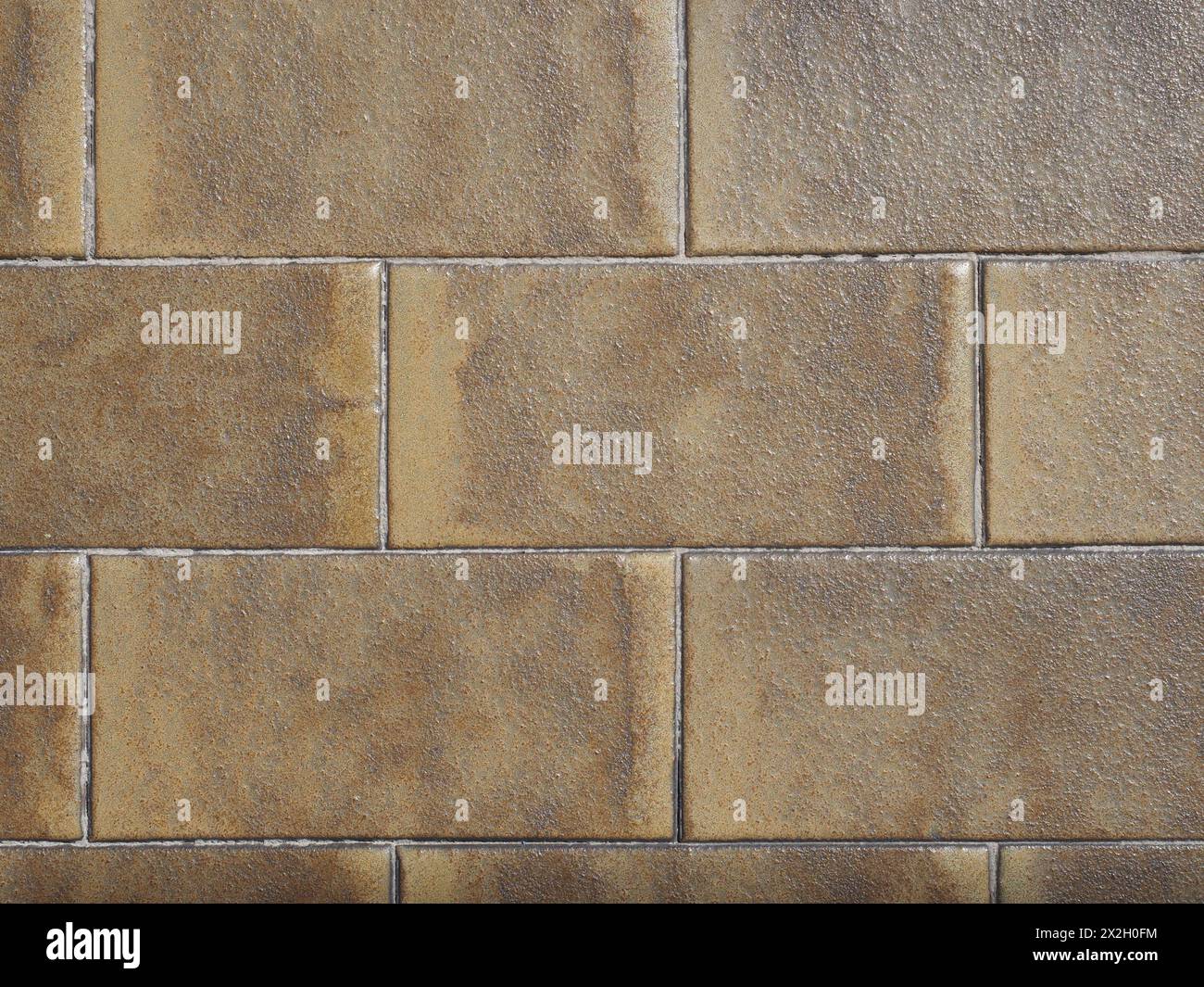 brown ceramic tiled floor useful as a background Stock Photo