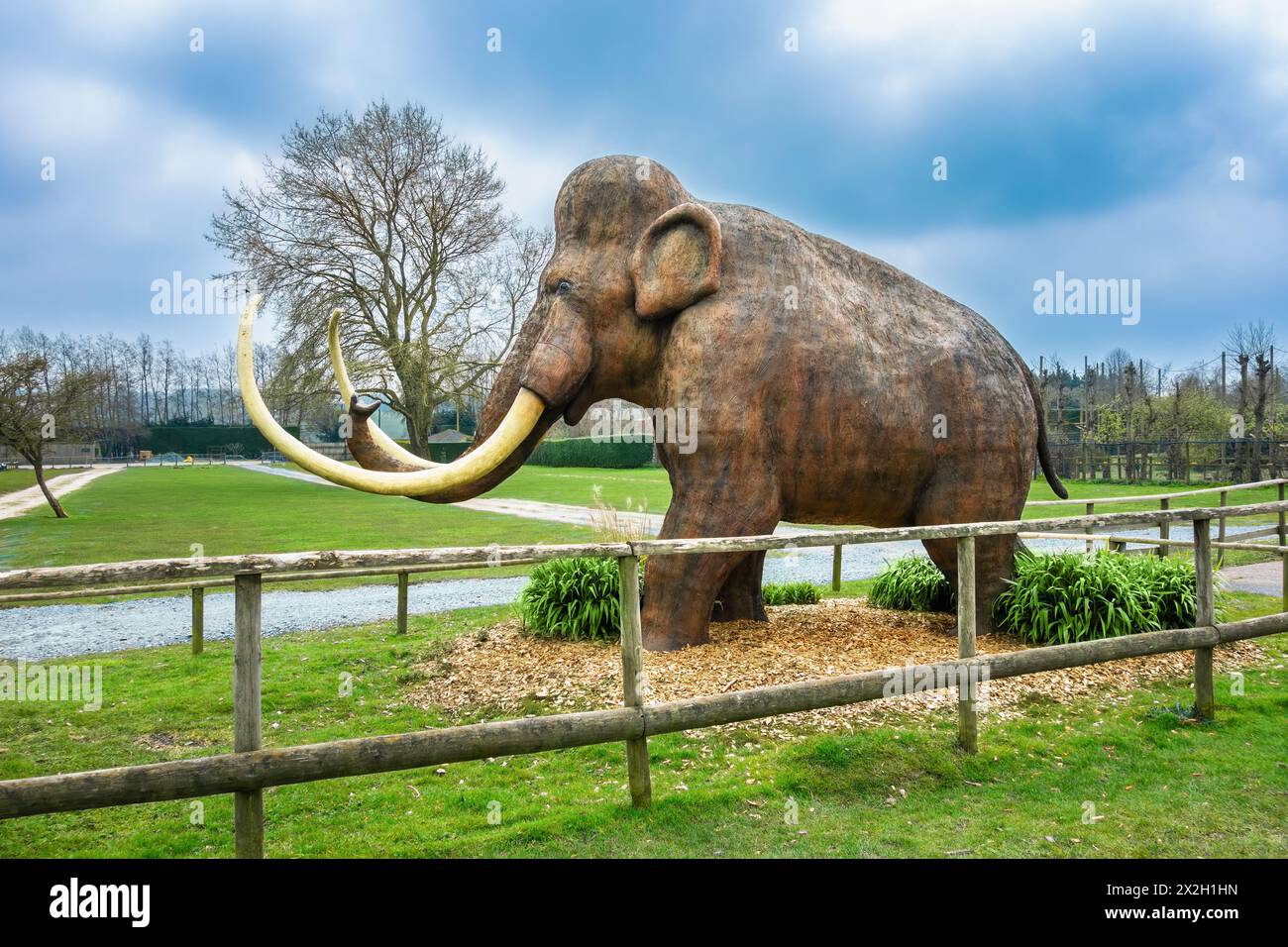 Woolly Mammoth statue at the entrance to Howletts wild animal park near Canterbury Stock Photo