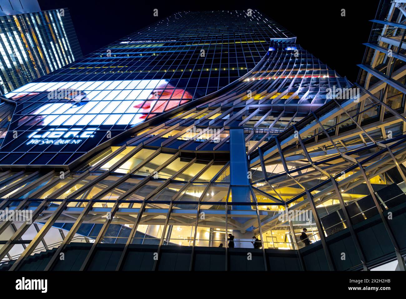 TOKYO/JAPAN - November 22, 2023:Night view of the Shibuya Scramble building Stock Photo