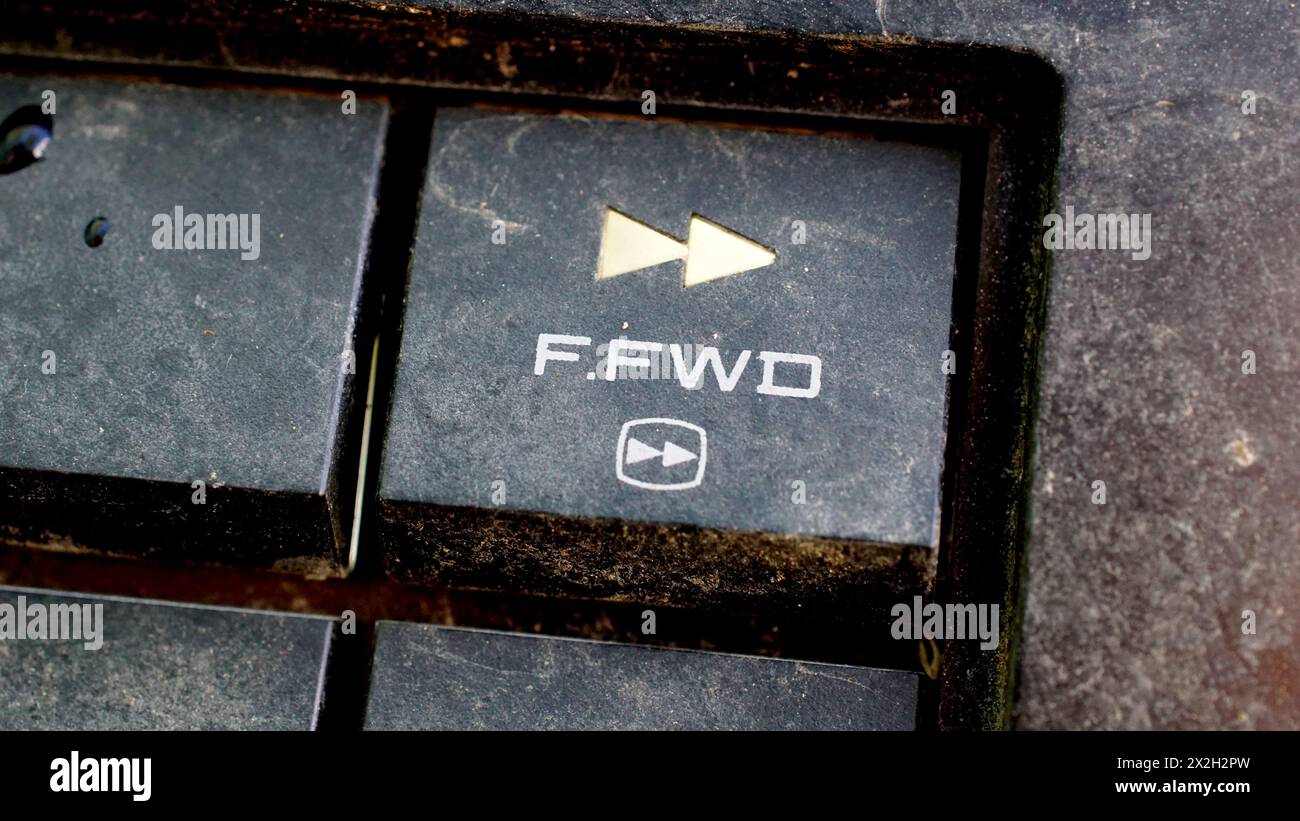 Old VHS video recorder dirty control buttons. Stock Photo
