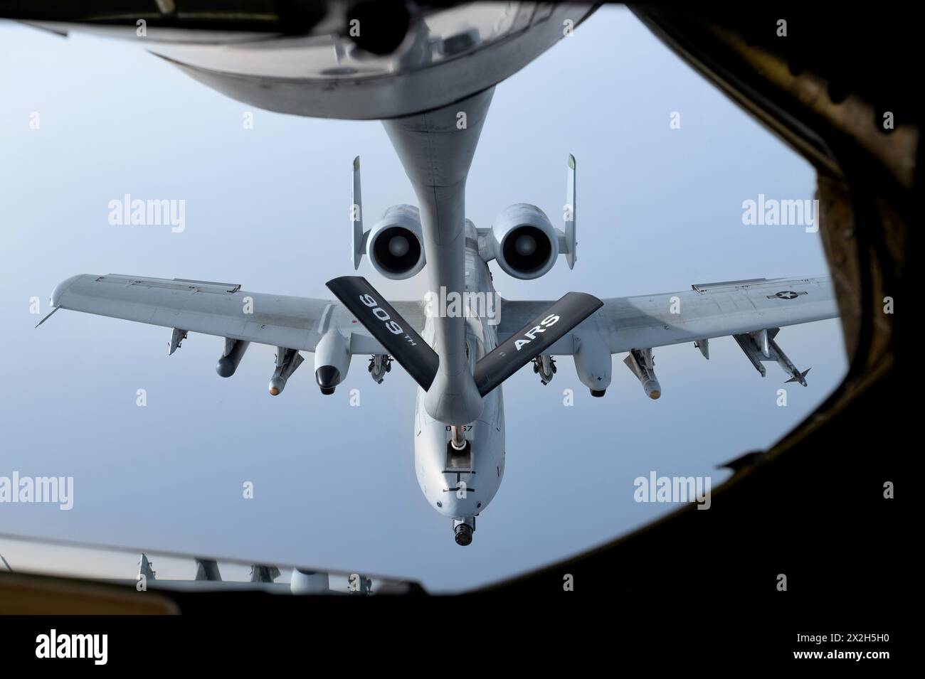 Pacific Ocean, United States. 17 April, 2024. A U.S. Air Force A-10 Thunderbolt II close air support aircraft with the 25th Fighter Squadron, is refueled in flight by a KC-135 Stratotanker, April 17, 2024, over the Pacific Ocean.  Credit: SrA Yosselin Campos/US Air Force/Alamy Live News Stock Photo