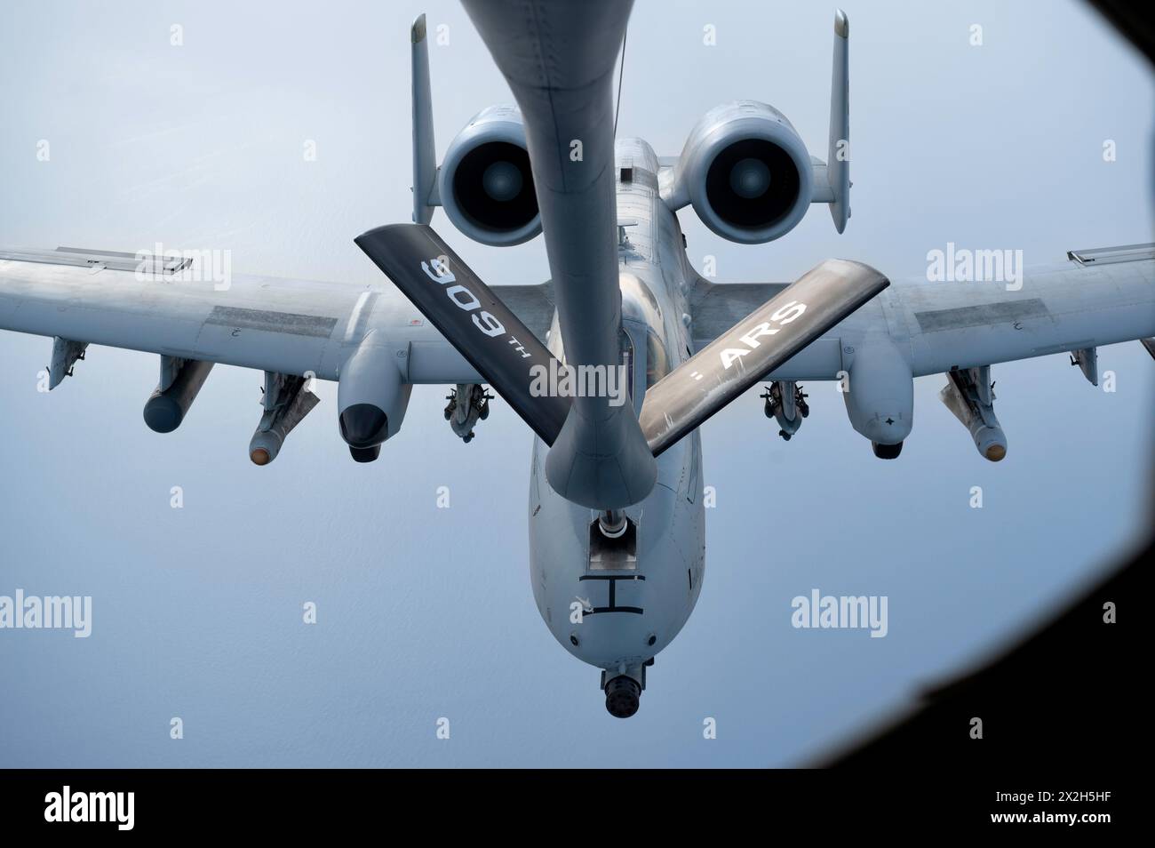 Pacific Ocean, United States. 17 April, 2024. A U.S. Air Force A-10 Thunderbolt II close air support aircraft with the 25th Fighter Squadron, is refueled in flight by a KC-135 Stratotanker, April 17, 2024, over the Pacific Ocean.  Credit: SrA Yosselin Campos/US Air Force/Alamy Live News Stock Photo