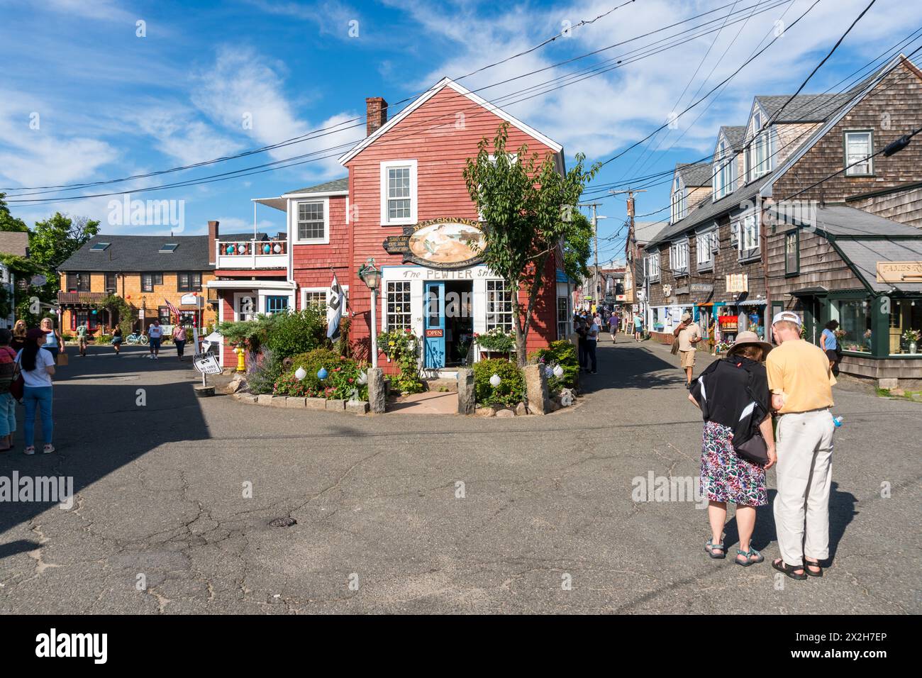 Rockport, USA - August 11, 2019:People and tourists stroll through the streets and numerous shops in Rockport, Massachusetts during a sunny day Stock Photo