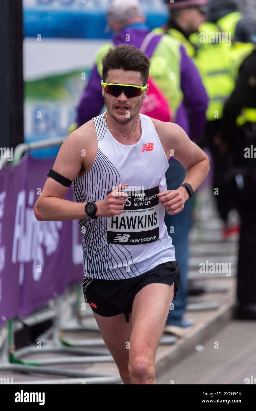Callum Hawkins competing in the TCS London Marathon 2024 passing through Tower Hill, London, UK. Stock Photo