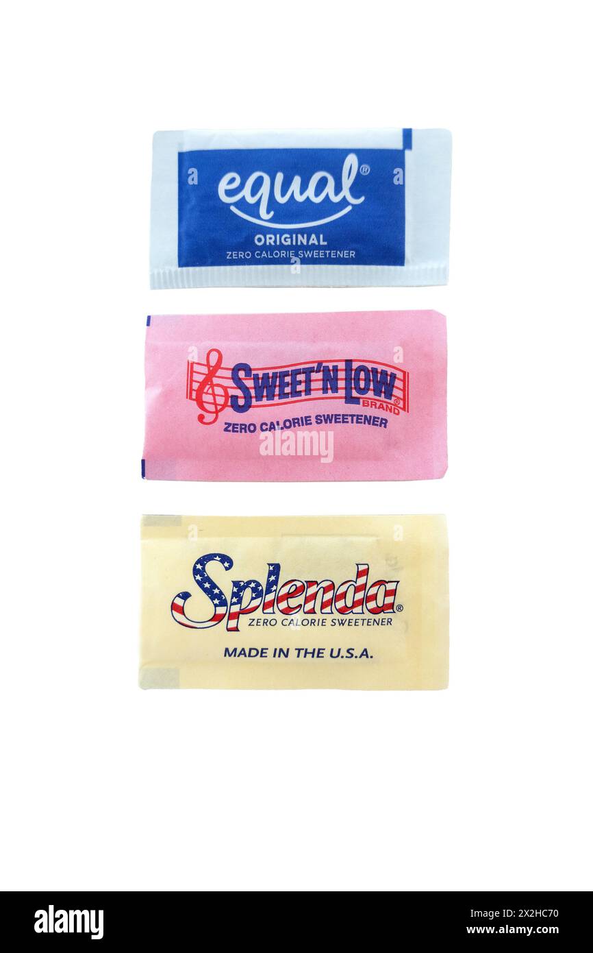 American Artificial Individual Sweetener Packs From Equal Sweet N' Low And Splenda Cutout On A White Background Stock Photo