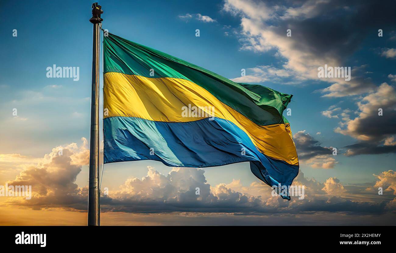 Die Fahne von Gabun flattert im Wind, isoliert gegen blauer Himmel Stock Photo