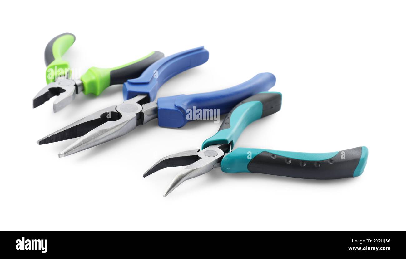 Different pliers isolated on white. Construction tool Stock Photo