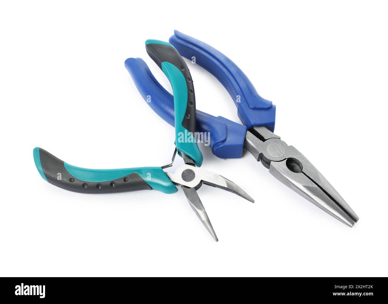 Different pliers isolated on white. Construction tool Stock Photo