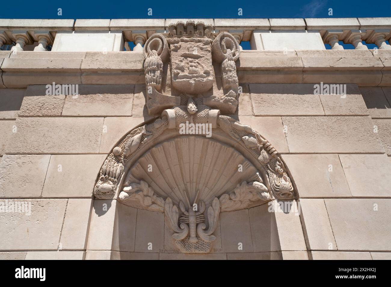 Relief ornaments above an old fountain, Les Sables-d'Olonne, Vandee, France Stock Photo
