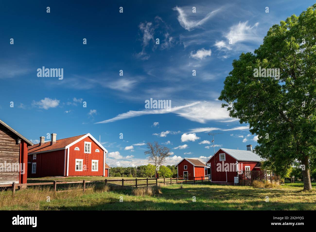 Falun red or Swedish red painted houses, farm, Geta, Aland, or Aland Islands, Gulf of Bothnia, Baltic Sea, Finland Stock Photo
