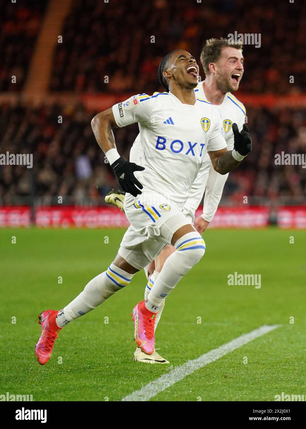 Leeds United's Crysencio Summerville (left) celebrates scoring their side's fourth goal of the game during the Sky Bet Championship match at the Riverside Stadium, Middlesbrough. Picture date: Monday April 22, 2024. Stock Photo