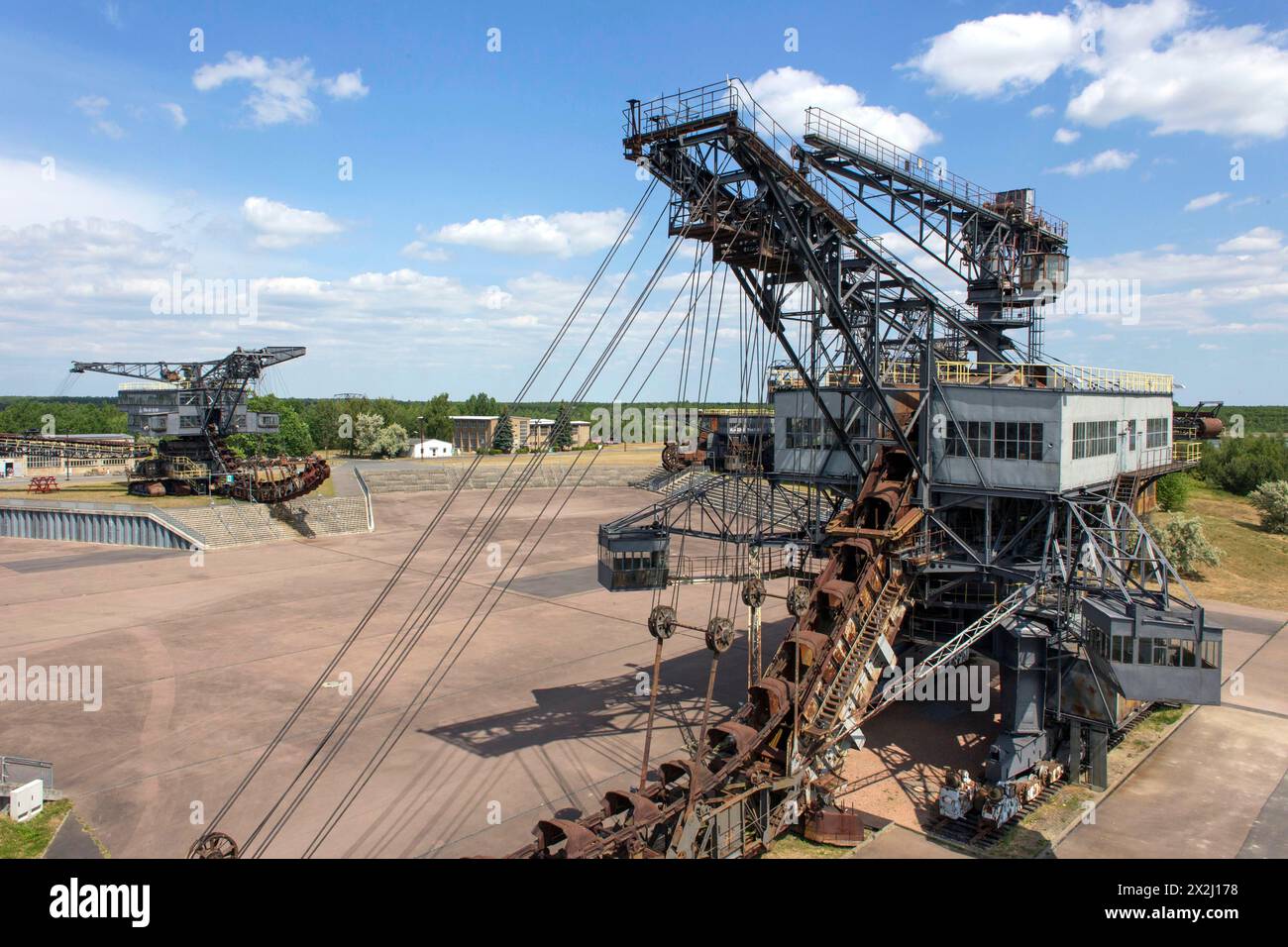 Ferropolis, the city of iron, consists of five old bucket-wheel and bucket-chain excavators. They are located on a peninsula in Lake Gremlin. Lignite Stock Photo