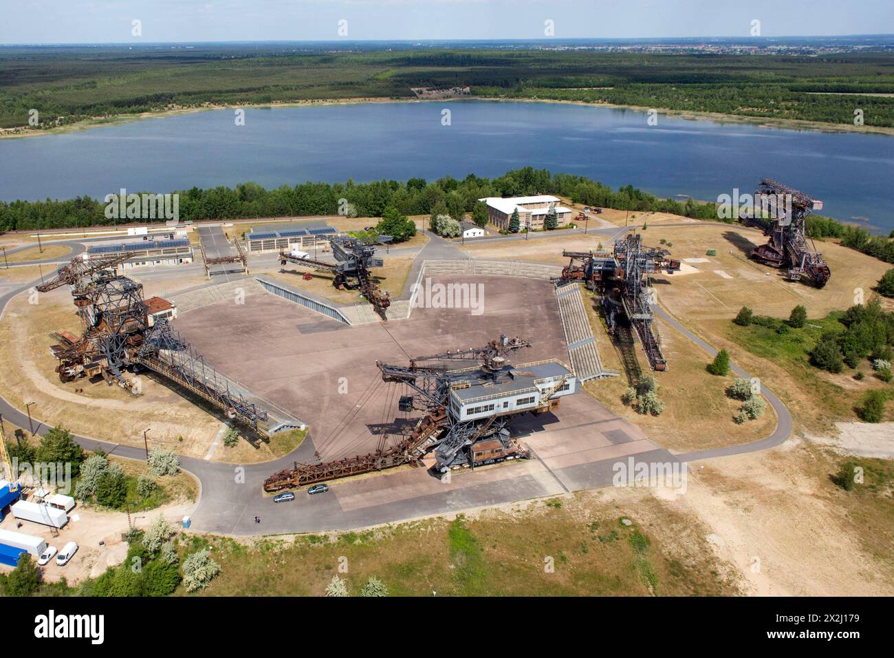 Ferropolis, the city of iron, consists of five old bucket-wheel and bucket-chain excavators. They are located on a peninsula in Lake Gremlin. Lignite Stock Photo