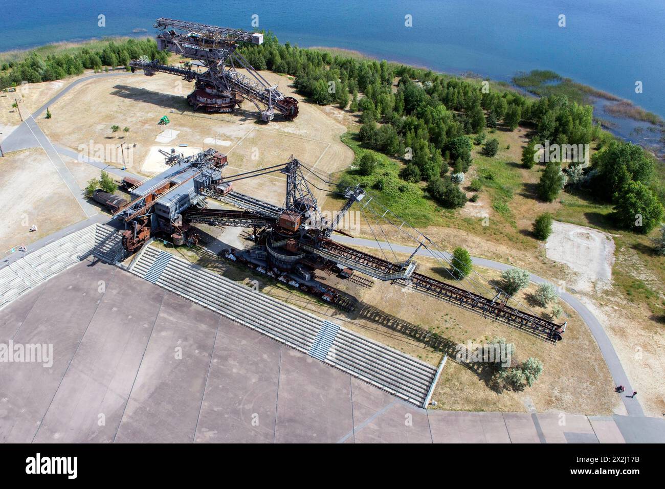Ferropolis, the city of iron, consists of five old bucket-wheel and bucket-chain excavators. They are located on a peninsula in Lake Gremlin. Lignite Stock Photo